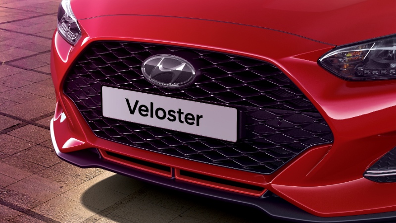 Sporty cascading signature grille.